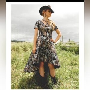 Black and gold evening or cocktail dress.